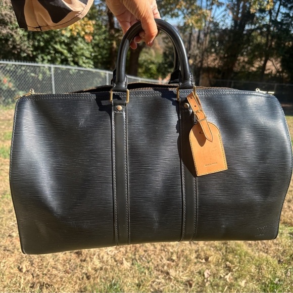 Louis Vuitton Handbags - NWOT Louis Vuitton Keepall 50 Blk Epi w/Vachetta luggage tag and handle fastener